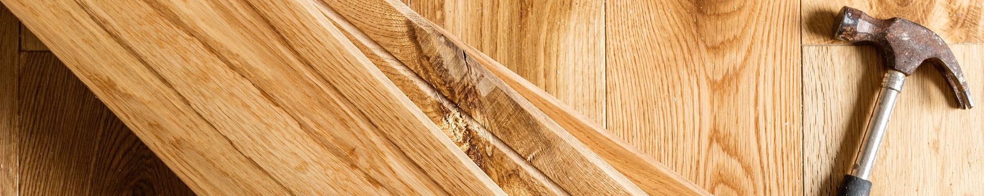 Hammer on wood planks Carpet For Less in Belton, MO